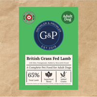 A green bag of Growler & Prowler British Grass Fed Lamb dog food. The bag features a dog and a cat, the company logo, and information about the product, including the ingredients and nutritional content.